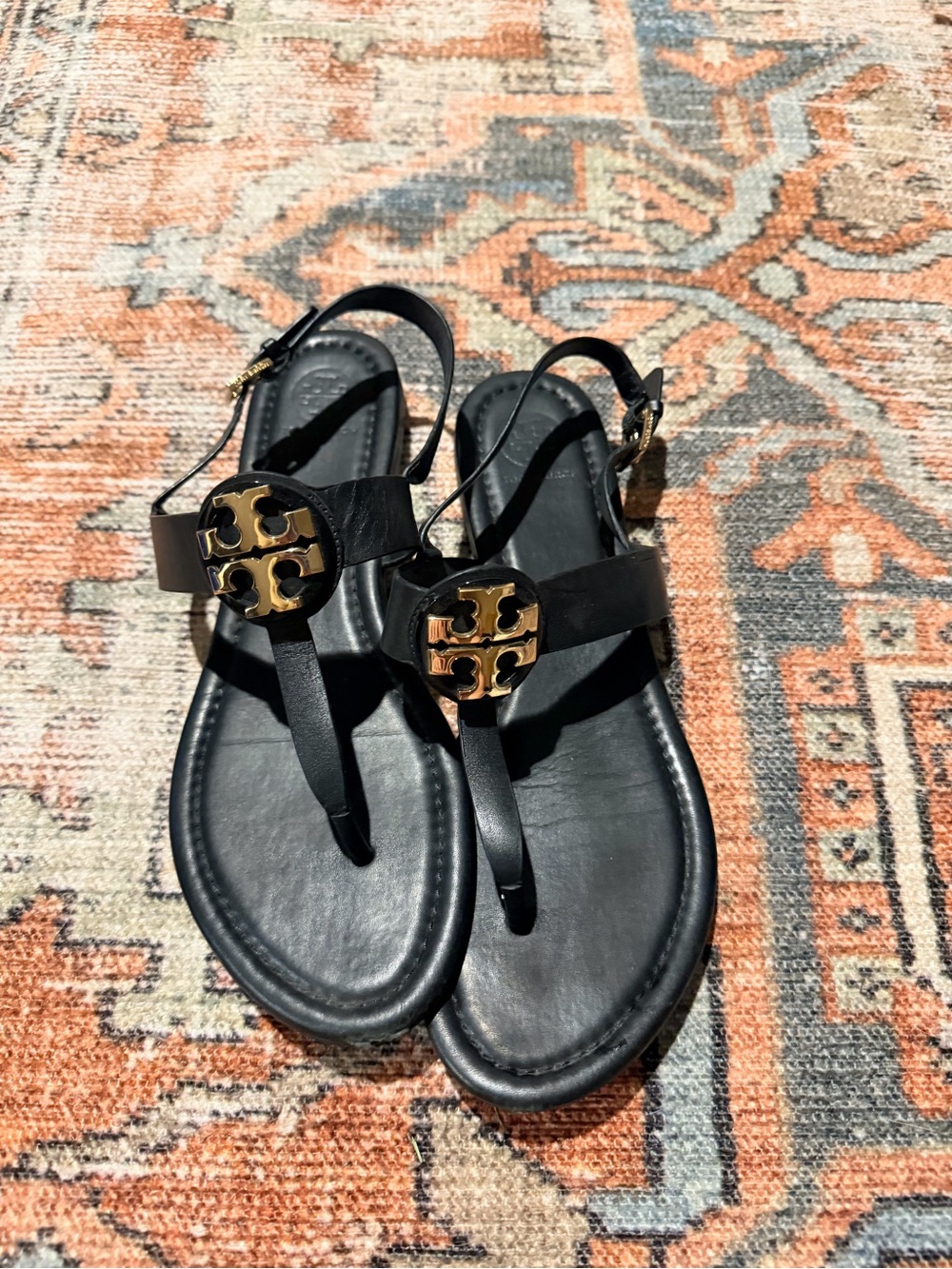 Tory Burch Black Leather Logo Thong Sandals with Gold Medallions